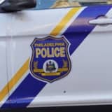 Philly Police Officer Dragged By Armed Driver In Stolen Car: Report