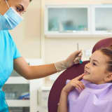 Children’s Dental Health Month: Connecting The Dots Between Oral Health And Overall Health