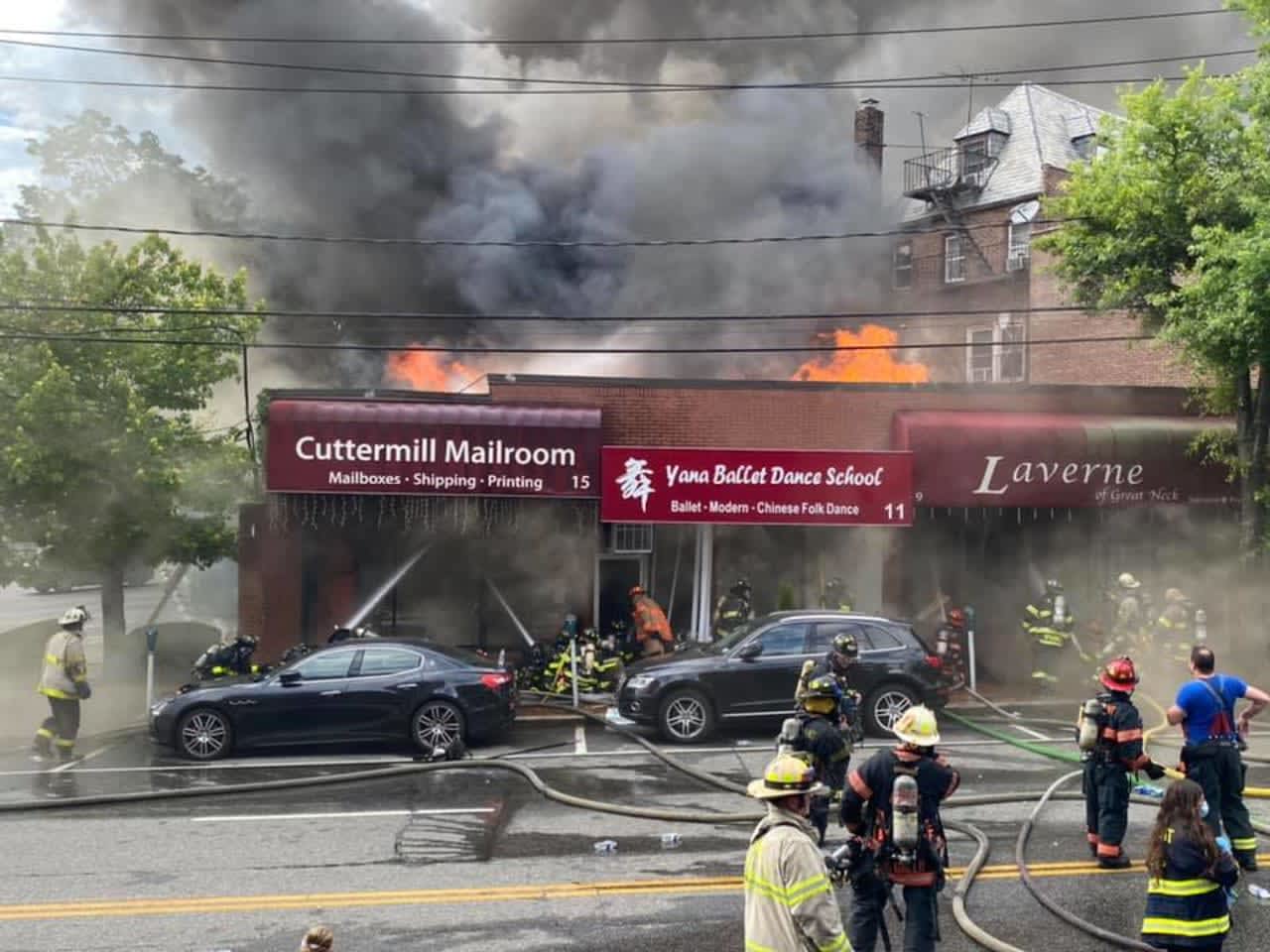 A massive five-alarm fire destroyed four businesses in Great Neck.