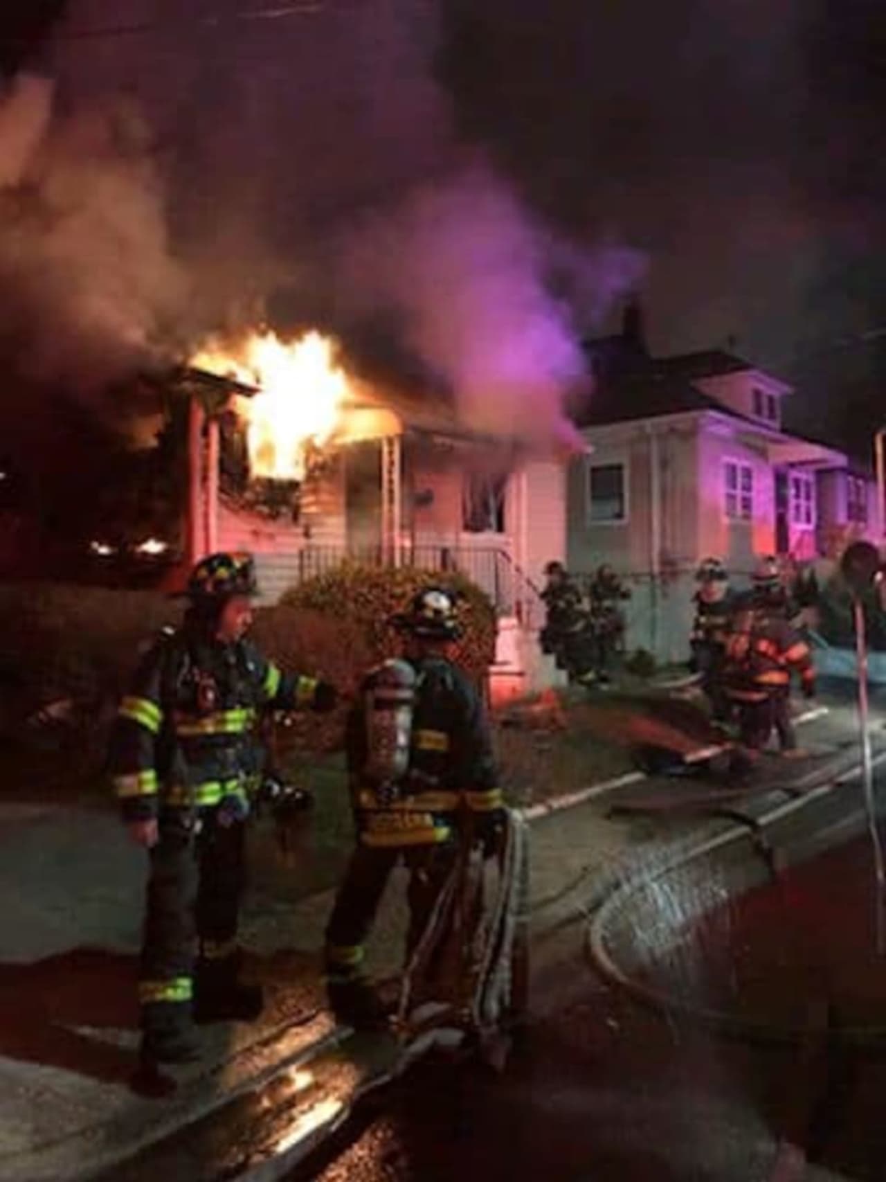 Inwood firefighters battle a house fire on Monroe Avenue.