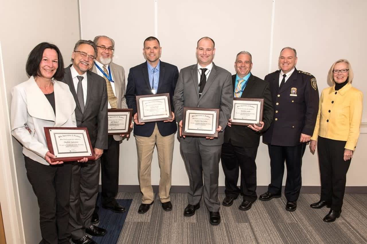 Metro-North employees were honored for saving the life of a co-worker who was having a heart attack.