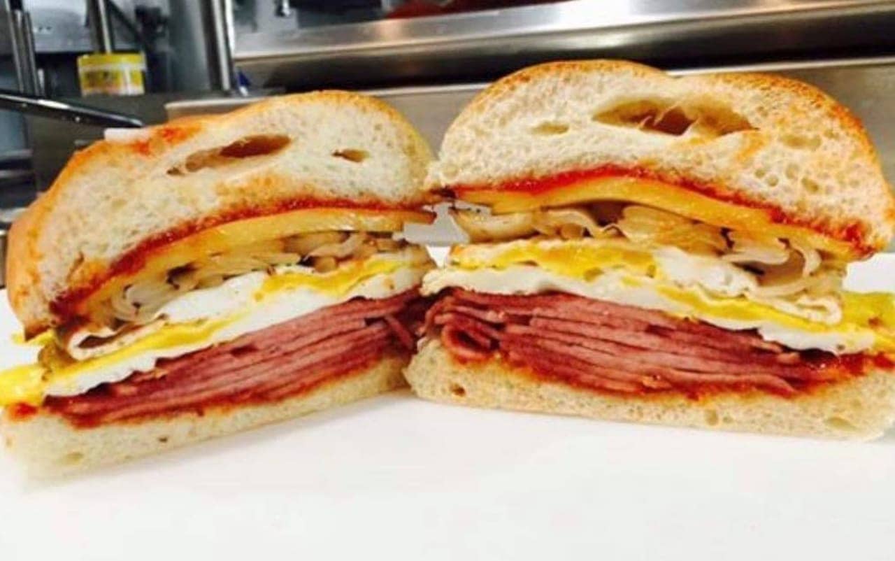 Taylor ham (most definitely NOT pork roll, the owners say), egg, cheese and onion with sriracha ketchup at Millburn Deli. 
.