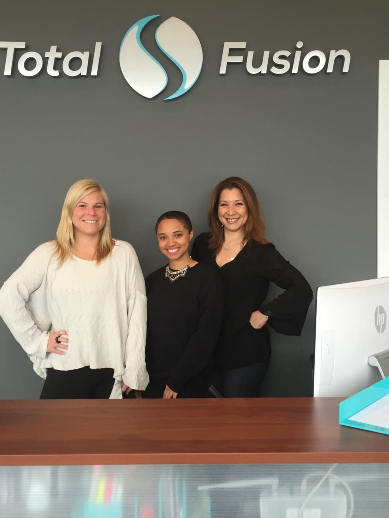 Some of the staff at the new TotalFusion in Harrison; left to right, Megan Carron, Stephanie Jiminez, and Toni DAmario (Fiore).