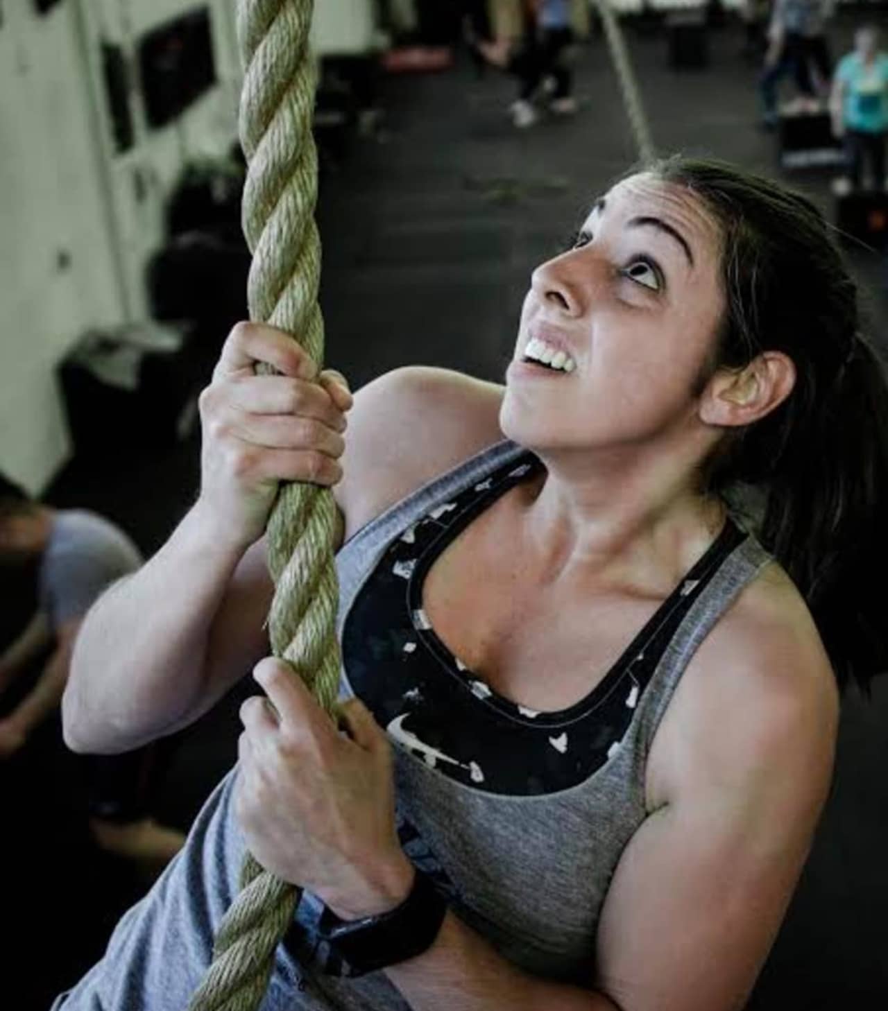 State Trooper Dana Wilcomes climbs a rope in Guerrilla Fitness Paramus.