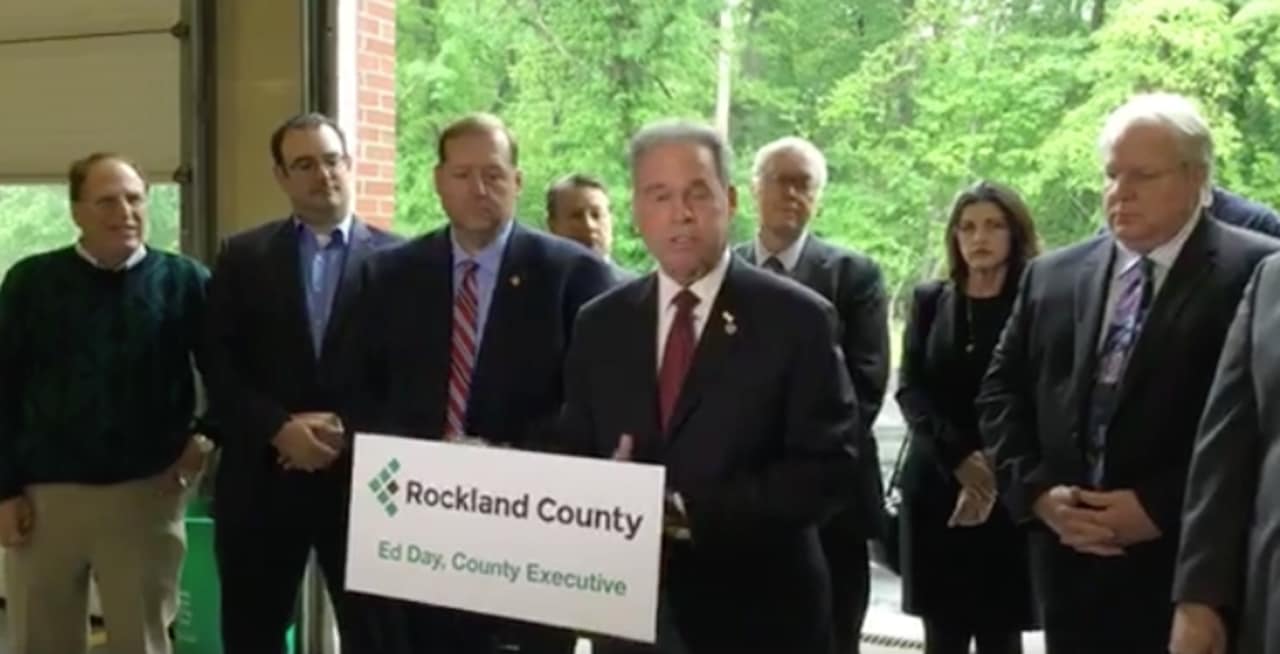 Ed Day and other county leaders as they oppose the Patrick Farms development.