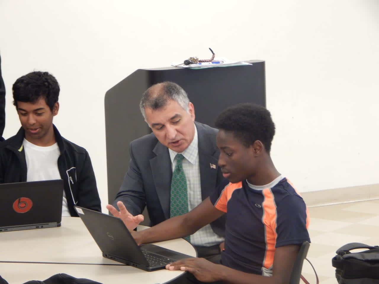 State Sen. Carlo Leone, shown mentoring a student at an SPEF meeting, is US Day 2016 honorary chair.