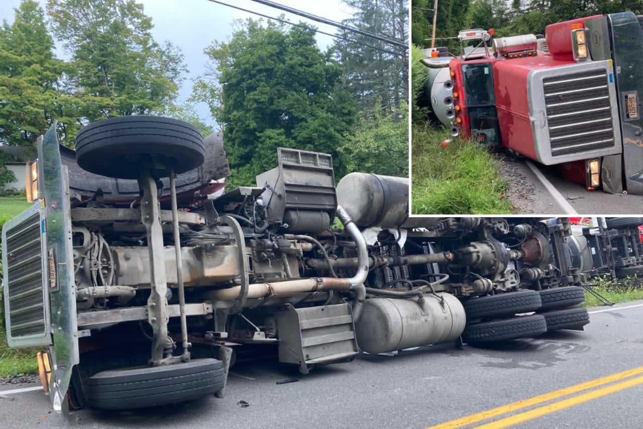 A tanker truck carrying 8,000 gallons of tar overturned in the Town of Esopus, at Old Post Road and Maple Street, on Thursday, Sept. 8.