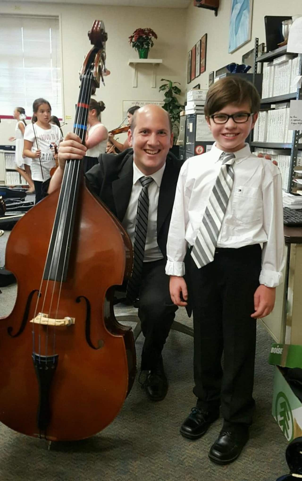 Music teacher Matt Rotjan, left, is seen here with a student in the South Orangetown school district.