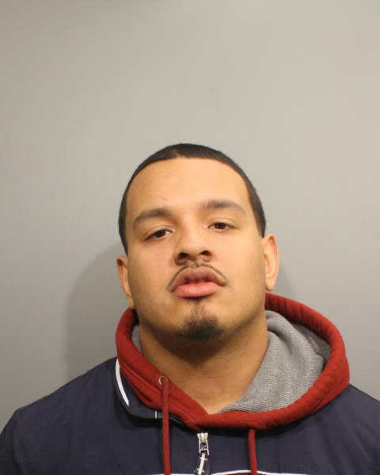 Stamford resident Angel Rodriguez was charged in the November 22 theft from Anconas Wines & Liquors in Wilton. 