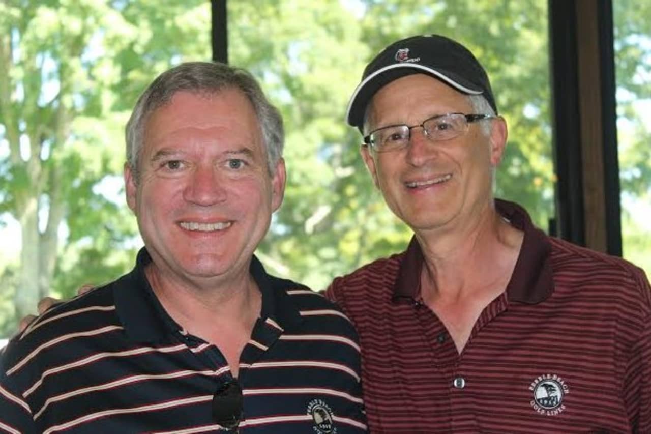 Mark Tonucci, left, and Michael Portnoy of Westport Resources were among a threesome that won a grant from Fairfield Community Foundation at a recent golf tournament. Along with Paul LaBossiere, they split the $5,000 grant among three charities.
