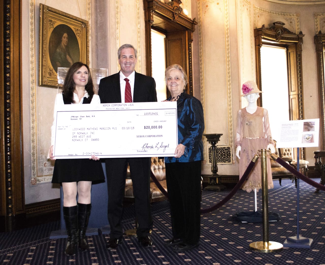 From left, Lockwood-Mathews Mansion Museum executive director Susan Gilgore, Mark Conlin, president, The Xerox Foundation, and LMMM chairman of the board Patsy Brescia.