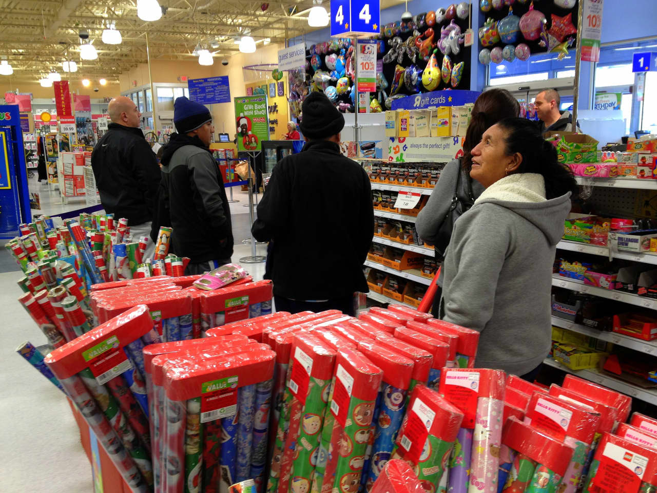Shoppers at Toys "R" Us, which is closing about one-fifth of its stores across the nation.