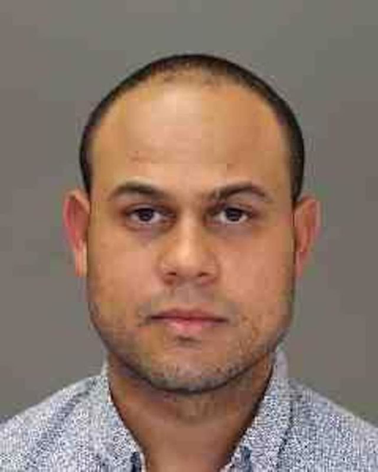 Adraian Valentin-Polanco is being at the Ramapo Police Department on charges that he assaulted two local women as they got out of their vehicles.