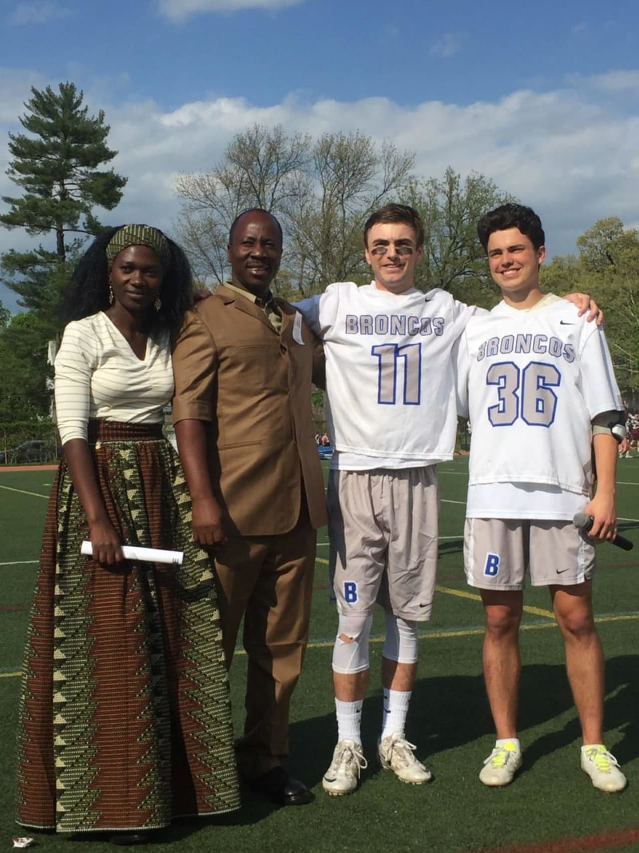 Bronxville High School seniors Nicholas O’Brien and Mac Crawford with two teachers from MainSprings during their May 7 lacrosse game.