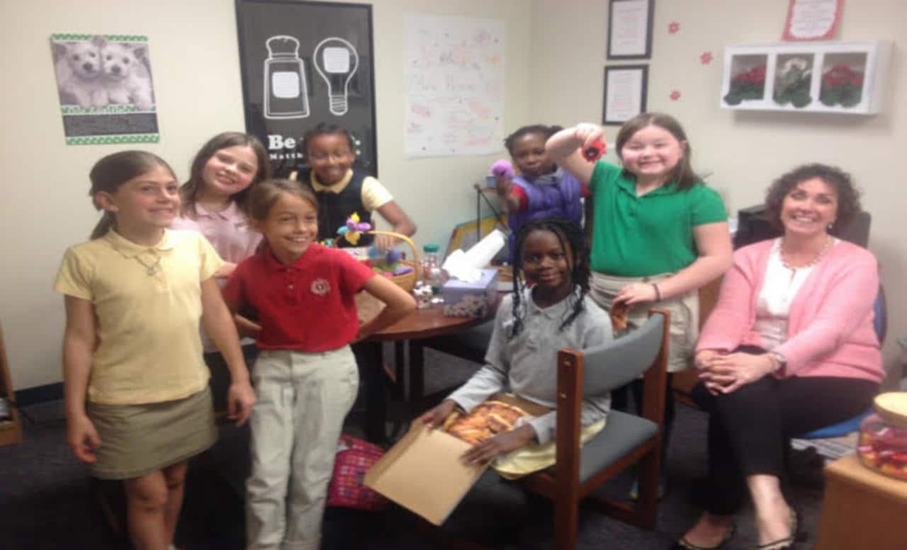 Guidance counselor Cathy Price with students at a lunch bunch in the 2014-15 school year.