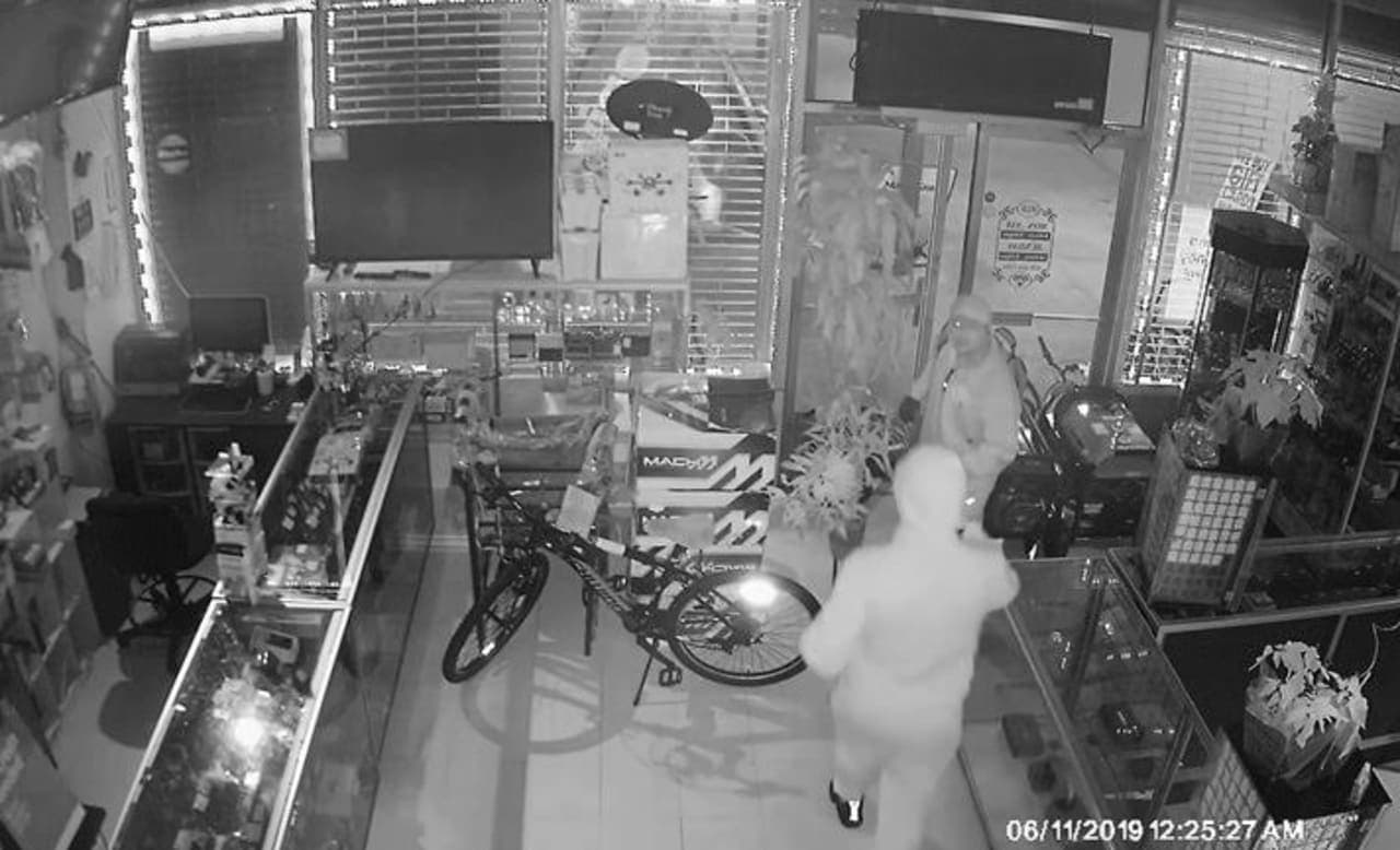 Police are asking for help identifying two men who allegedly burglarized the EZ Pawn Shop.