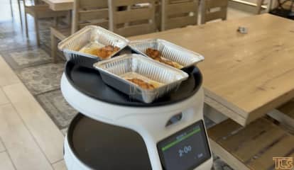 Robot Serves Diners At Restaurant In Lakewood