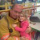 Bill Ackerson and daughter Samantha during Fire Prevention week in 2012.
