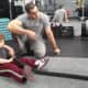 Moshe Klyman of Underground Training in Tenafly trains a young client on battle ropes.