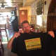 A "Screaming Sally" contest winner shows off his T-shirt at Chicken Todd's in Dumont.