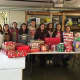 Northvale Girl Scouts wrap gifts for needy families. 