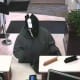 The suspect in the robbery of the Fairfield County Bank in Wilton at the teller station on Feb. 24.