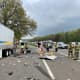 The tractor-trailers were significantly damaged in the crash, which spread debris throughout the highway, authorities said.