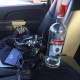 A man was arrested for drinking and driving with an open bottle of vodka.