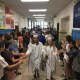 Haldane students walk through the middle school before graduation