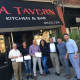 Mayor Joe Ganim, third from right, was on hand as L.A. Tavern held its grand opening in Bridgeport this week.