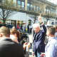 Former President Bill Clinton waving to people along Martine Avenue in White Plains on Tuesday.