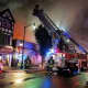 Within two hours, the fire had spread to several stores.