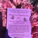 The pink roses from police officers came with a purple note promoting Wilton Restaurant Week and a fundraiser for the Domestic Violence Crisis Center.