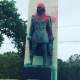 The statue of Christopher Columbus in Seaside Park in Bridgeport was vandalized with red paint and tagged with the words “Kill the Colonizer” in white paint at the base.