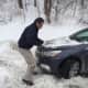 Gov. Andrew Cuomo helps a stranded driver on a stretch of the Sprain Brook Parkway near Hawthorne in February, 2017.