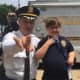 Teaneck Police Chief Glenn M. O'Reilly with Gianna Yepez, 7.