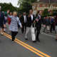 Chappaqua's Bill and Hillary Clinton with fellow Town of New Castle resident, Gov. Andrew Cuomo, marching in the New Castle Memorial Day Parade.