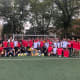 Port Authority police officers based at Newark Airport bought new uniforms for the girls soccer team at East Side High.
