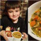 Cooper and his trial batch of chicken noodle soup.