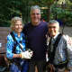 Barbara Stetson, Stephen Stout (Trinity Outreach Committee) and Bahman Azarm at The Adventure Park before Barbara's climb. 
