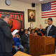 Bergenfield Board of Education Trustee Anthony Cortez takes the oath of office.