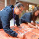 Croton-Harmon High School students signed an anti-bullying pledge on Unity Day and donned orange bracelets reading “Croton Unites” to send an anti-bullying message.