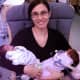 “For a long time, I was on a treadmill and not able to see the big picture and focus on anything other than the kids,” recalled Christine Maltese Yang, seen here holding Daniel (left) and Sofia (right) in the NICU.