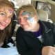 Professional face painter Claudia Nieswand of Pompton Lakes is pictured with her husband Steve.