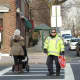 Leonia school crossing guard Charlie Lee surprised Jamie Sclafane January 7 when he jumped in front of a car and forced the driver to stop so she could cross safely with her 2-year old daughter.