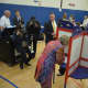 Democratic presidential candidate Hillary Clinton puts down her vote for the New York primary.