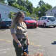 Bridgeport Chief Animal Control Officer Jennifer Wallace gets ready to tae Caramel on a walk.