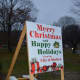 Several signs of the holiday season remained on Huntington Green Thursday.