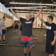Guerrilla Fitness Paramus owner Joe Ghaznavi guides Wilcomes during lunges.