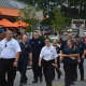 Members of the Mount Kisco Volunteer Ambulance Corps march in the fire department's parade.